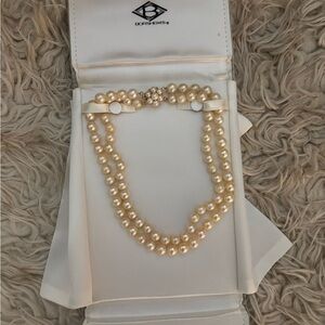 Akoya double strand pearl necklace. 14k